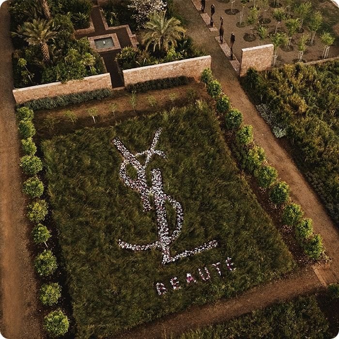 2025 loreal luxe brand ysl beauty ysl logo on grass