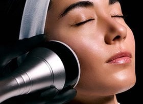 2026 dermatological beauty division woman getting treatment on her face